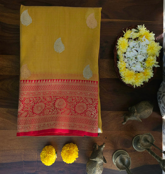 Yellow Pure Tissue silk with Heavy Zari Border